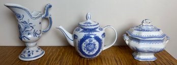 Three Blue And White Dishes