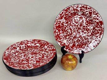 Twelve Red And White Enamel Dinner Plates