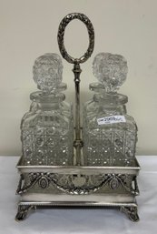 Silver Plate Tantalus, Four Cut Glass Decanters