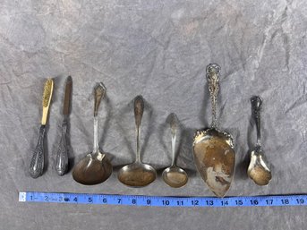 Seven  Assorted Pieces Of Sterling Flatware