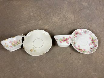 Duo Of Matching Teacups And Saucers With Floral Designs