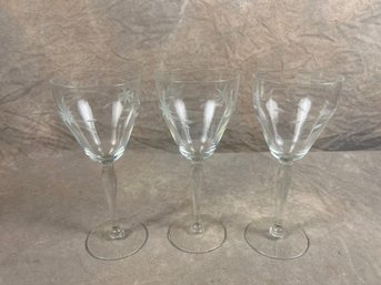Set Of Three Ornate Etched Crystal Wine Glasses