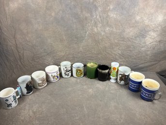 Large Group Of Assorted Mugs, Varying In Material And Design