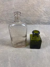 Two Antique Glass Bottles, Warranted Flask And Olive Green Square Bottle