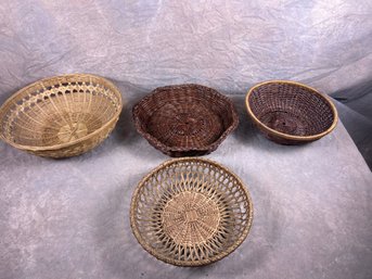 Set Of Four Vintage Woven Baskets